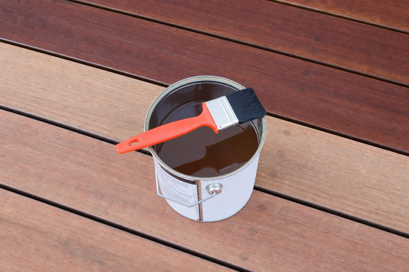 Fence staining and sealing